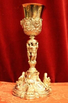 Exceptional Chalice With Paten And Original Case. Weight: 954 Gram.3  Silver Images As Nodus And Full Silver Imaginations Of Faith, Hope And Love On The Base. style Baroque en full silver, 19th century ( anno 1840 )