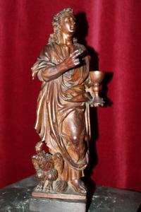 High Quality Statue Of St. John Evangelist style baroque en hand-carved wood, Lime Tree, Belgium 17 th century