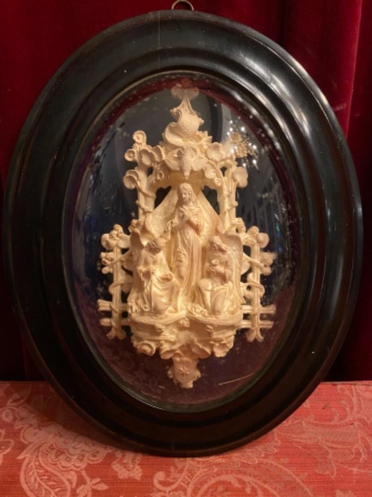 1  Carved Material Behind Glass Timber Frame