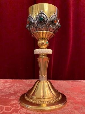 Chalice en Silver, partly gilt,red and green gemstone cabochons, nodule with ivory, Hungary 19 th century
