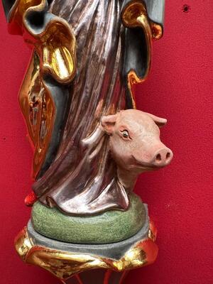 St. Anthony Abbot Sculpture With Hanging Pedestal en Carved - Wood / Polychrome / Gold Leaf Covered, Southern Germany 20 th century