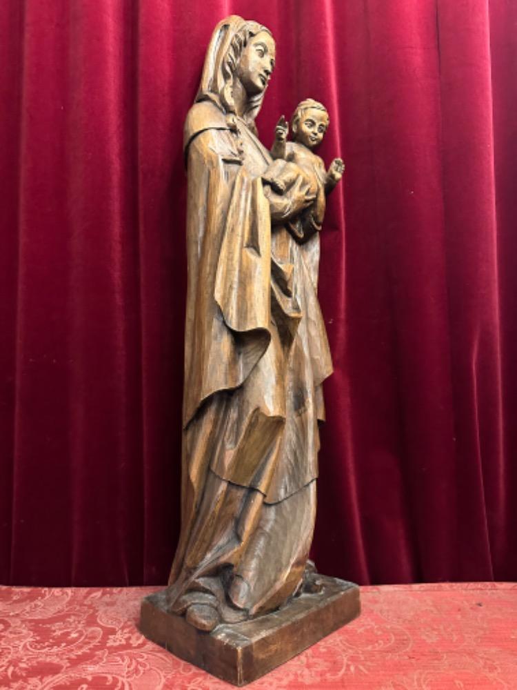 1  St. Mary With Child Sculpture.