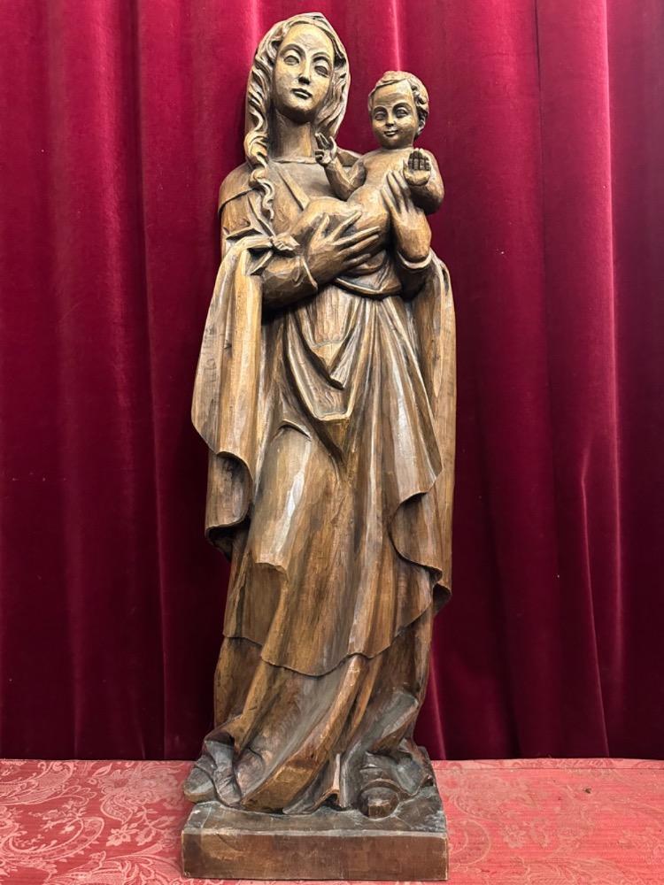 1  St. Mary With Child Sculpture.