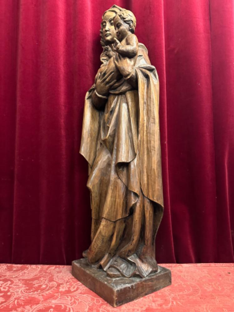 1  St. Mary With Child Sculpture.