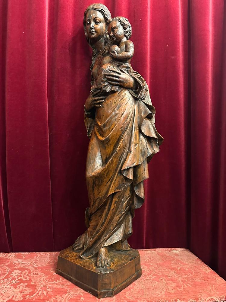 1  St. Mary With Child Sculpture.