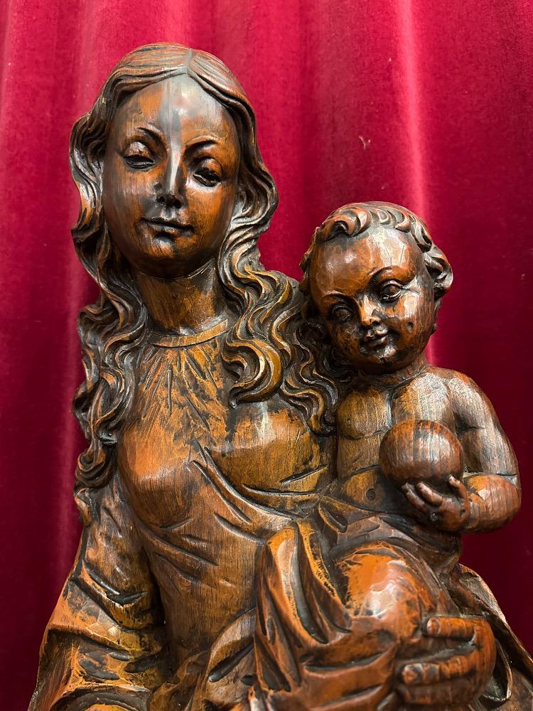1  St. Mary With Child Sculpture.
