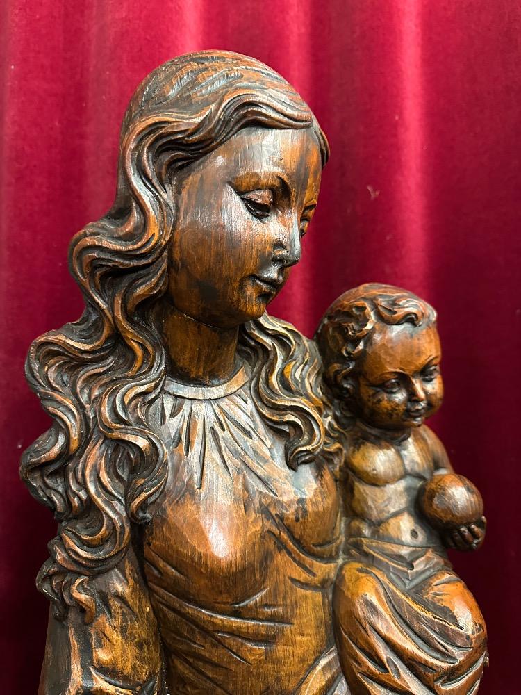 1  St. Mary With Child Sculpture.